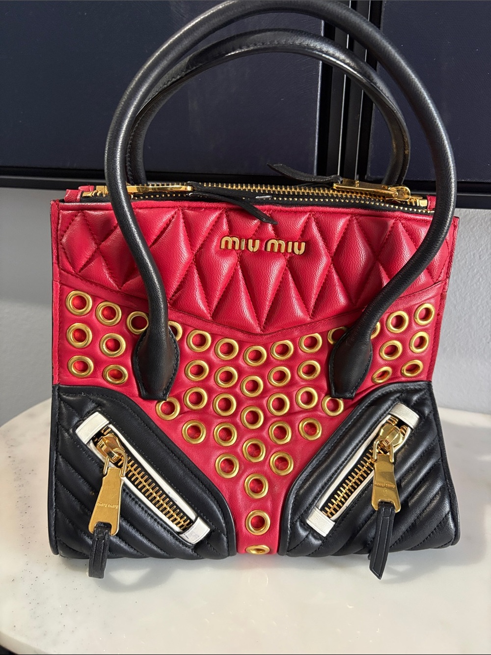 Miu Miu Red and Black Quilted Leather Satchel with Gold Eyelet Detail